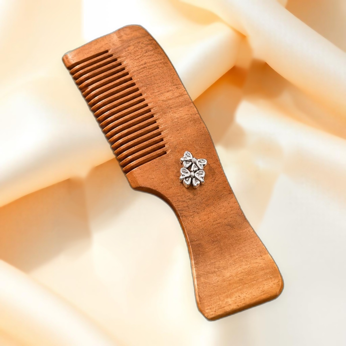 Silver-Inlay Neem Comb — Neem-wood comb with silver flower