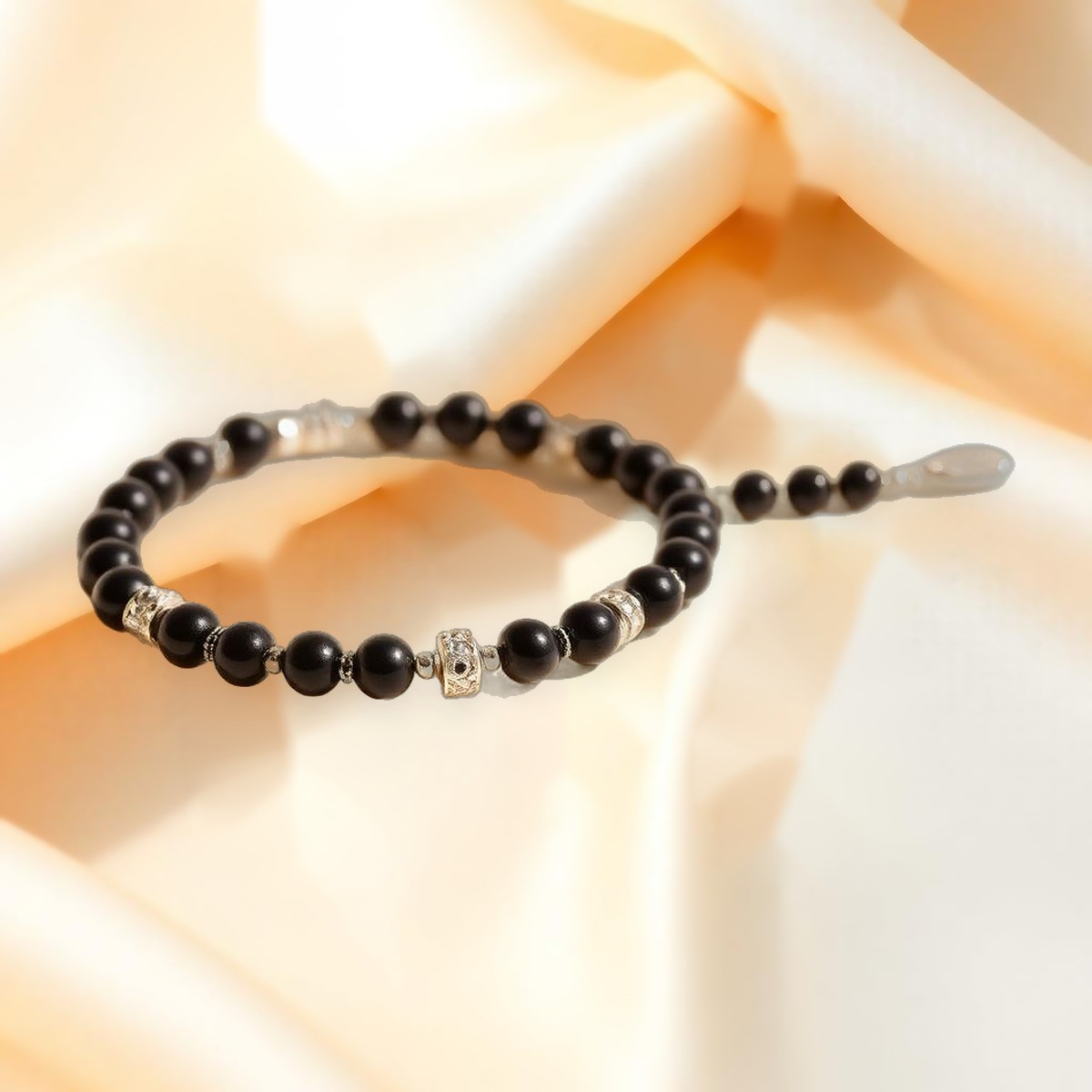 Baby Nazariya & Toe Rings — Black bead bracelet with silver